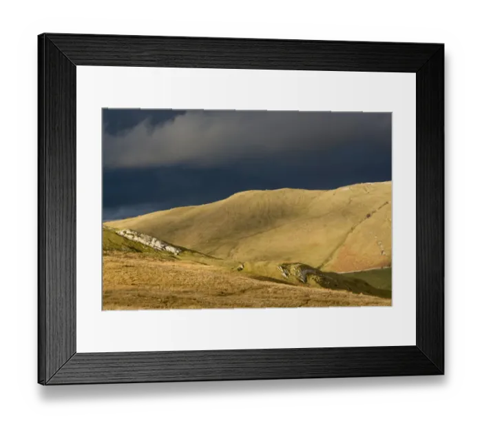 Framed Print : Evening sunlight on fells with stormclouds behind, near Kirkby Stephen, Cumbria, England, March Framed Print : Evening sunlight on fells with stormclouds behind, near Kirkby Stephen, Cumbria, England, March