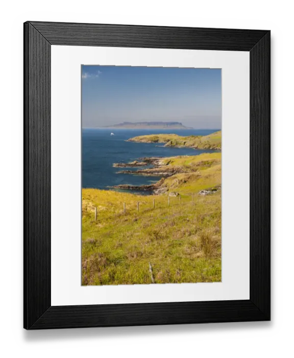 Framed Print : View of coastline and distant island, looking towards Eigg, Small Isles, across Sound of Sleat from Aird of Sleat Framed Print : View of coastline and distant island, looking towards Eigg, Small Isles, across Sound of Sleat from Aird of Sleat