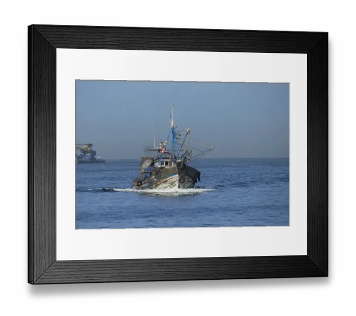 Framed Print : Fishing boat with beam trawls at sea, Morocco, November Framed Print : Fishing boat with beam trawls at sea, Morocco, November