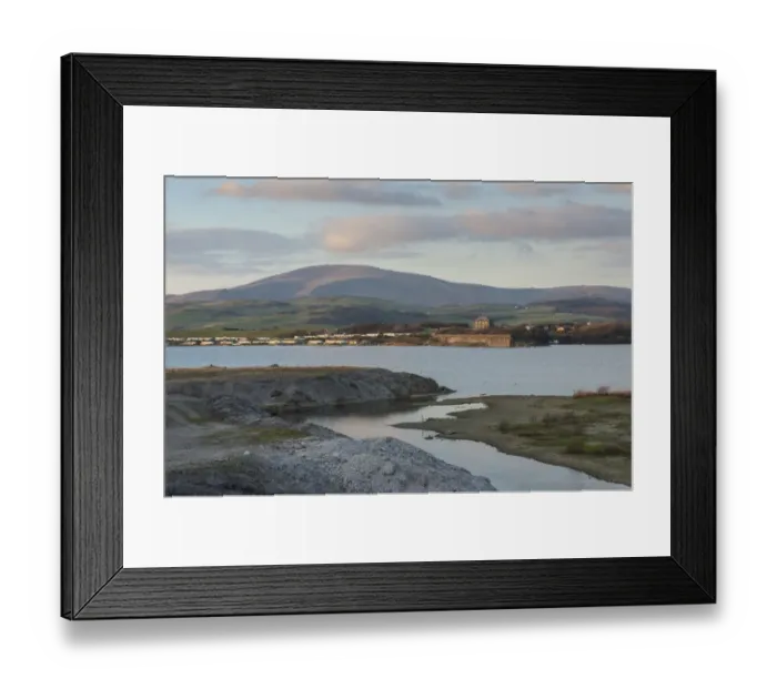 Framed Print : View of flooded former iron ore mining area, surrounded by sea wall on outskirts of Millom Framed Print : View of flooded former iron ore mining area, surrounded by sea wall on outskirts of Millom