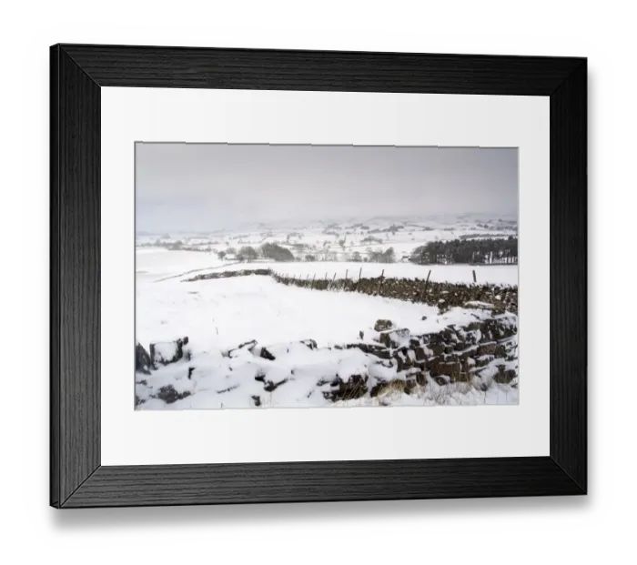 Framed Print : View of snow covered drystone walls and farmland during snowstorm, Cumbria, England, March Framed Print : View of snow covered drystone walls and farmland during snowstorm, Cumbria, England, March