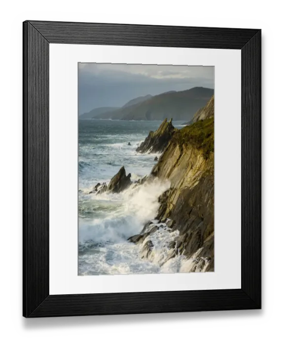 Framed Print : View of swell waves breaking and crashing against cliff at dawn, Coumeenole North, Dingle Peninsula, County Kerry Framed Print : View of swell waves breaking and crashing against cliff at dawn, Coumeenole North, Dingle Peninsula, County Kerry