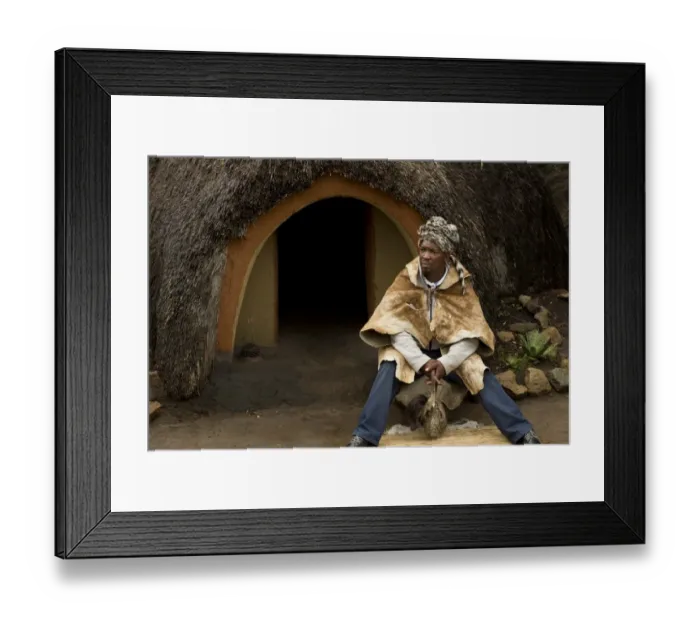 Framed Print : Inyanga herbal healer sitting outside hut in traditional Basutho village, Lesotho, November Framed Print : Inyanga herbal healer sitting outside hut in traditional Basutho village, Lesotho, November