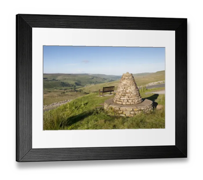 Framed Print : Cairn and bench on upland viewpoint overlooking valley, marking boundry of Muker Parish, Millennium Cairn Framed Print : Cairn and bench on upland viewpoint overlooking valley, marking boundry of Muker Parish, Millennium Cairn