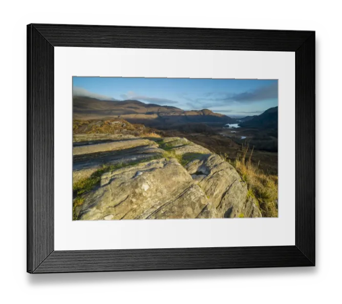 Framed Print : View over rocks on moorland towards lake and mountains at dawn, Ladies View, Lough Leane (Lower Lake) Framed Print : View over rocks on moorland towards lake and mountains at dawn, Ladies View, Lough Leane (Lower Lake)