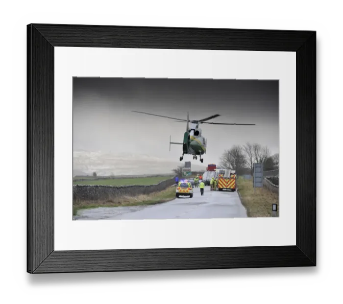 Framed Print : Air Ambulance attending road traffic accident in icy weather, Kirkby Stephen, Cumbria, England, December Framed Print : Air Ambulance attending road traffic accident in icy weather, Kirkby Stephen, Cumbria, England, December