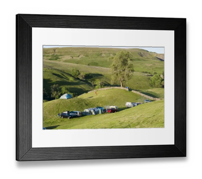 Framed Print : Campsite with campervans and tents on farmland in evening, Swaledale, Yorkshire Dales N. P