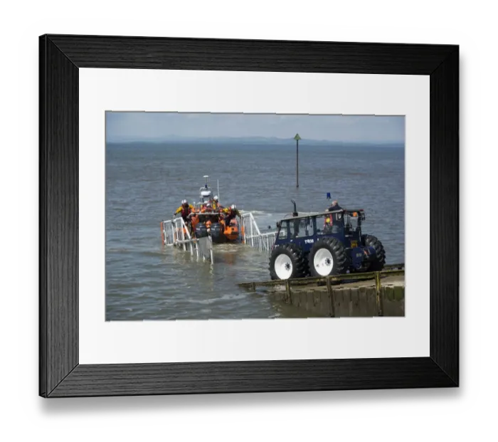 Framed Print : RNLI B-class Atlantic 85 rigid inflatable lifeboat, returning into launch ramp after training exercise, Silloth Framed Print : RNLI B-class Atlantic 85 rigid inflatable lifeboat, returning into launch ramp after training exercise, Silloth