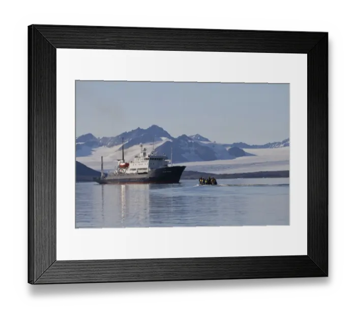 Framed Print : Zodiac inflatable boat with tourists approaching cruise ship, with glacier in background, Spitzbergen, Svalbard, july Framed Print : Zodiac inflatable boat with tourists approaching cruise ship, with glacier in background, Spitzbergen, Svalbard, july