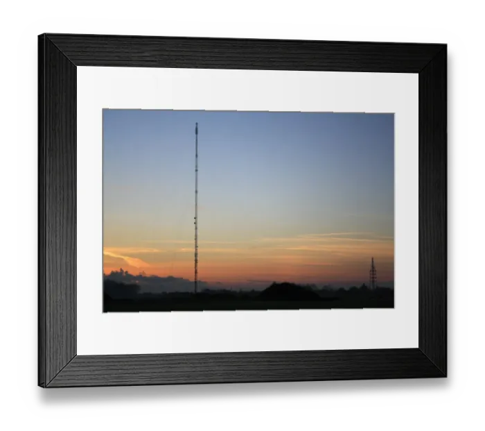 Framed Print : Broadcasting and telecommunication facility with guyed steel lattice mast silhouetted at sunset, Mendlesham Mast, Mendlesham Transmitting Station, Mendlesham, Suffolk, England, november Framed Print : Broadcasting and telecommunication facility with guyed steel lattice mast silhouetted at sunset, Mendlesham Mast, Mendlesham Transmitting Station, Mendlesham, Suffolk, England, november