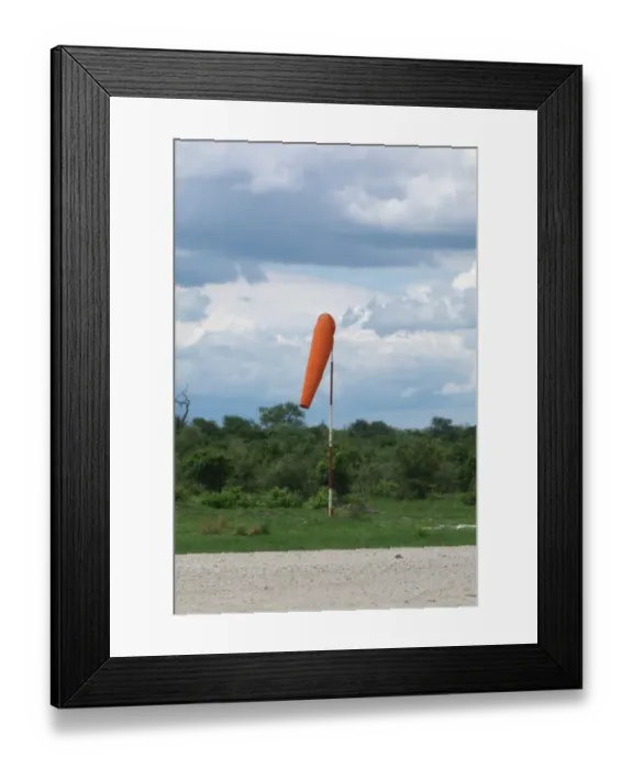 Framed Print : Windsock at edge of runway, Okavango Delta, Botswana Framed Print : Windsock at edge of runway, Okavango Delta, Botswana