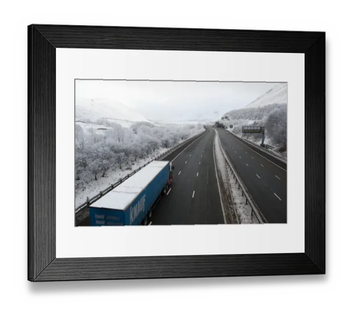 Framed Print : Lorry on motorway in snow, M6 Motorway, Tebay Gap, Cumbria, England, december