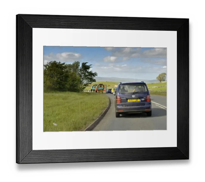 Framed Print : Queue of traffic behind horse drawn Gypsy caravans on road to Appleby Fair, Cumbria, England, may Framed Print : Queue of traffic behind horse drawn Gypsy caravans on road to Appleby Fair, Cumbria, England, may