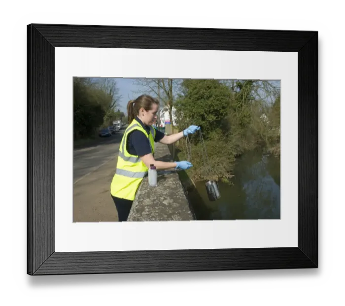 Framed Print : Water quality scientist from Thames Water, taking samples to be tested for traces of metaldehyde, carbetamide and propyzamide, River Cherwell, Cropredy Bridge, Oxfordshire, England, march Framed Print : Water quality scientist from Thames Water, taking samples to be tested for traces of metaldehyde, carbetamide and propyzamide, River Cherwell, Cropredy Bridge, Oxfordshire, England, march