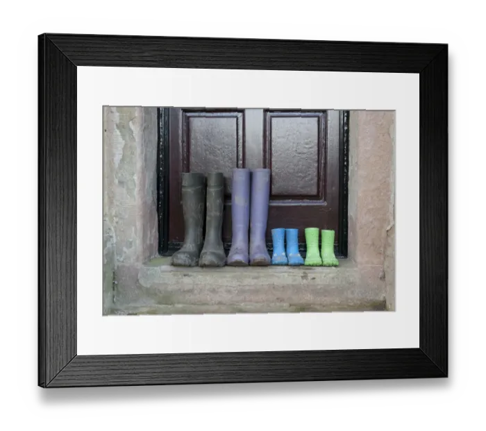 Framed Print : Four pairs of wellington boots, two children's pairs, one women's pair and men's pair, outside farmhouse door, Whitewell, Lancashire, England, december Framed Print : Four pairs of wellington boots, two children's pairs, one women's pair and men's pair, outside farmhouse door, Whitewell, Lancashire, England, december