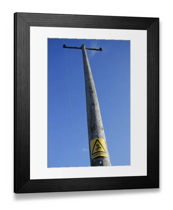 Framed Print : Danger of Death warning sign, on pole of overhead powerlines, Suffolk, England, october Framed Print : Danger of Death warning sign, on pole of overhead powerlines, Suffolk, England, october