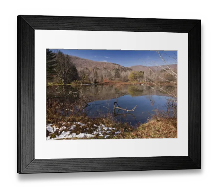 Framed Print : View of melting snow at edge of lake in woodland habitat, Oliverea, Catskill State Park, Catskill Mountains, New York State, U. S. A. november