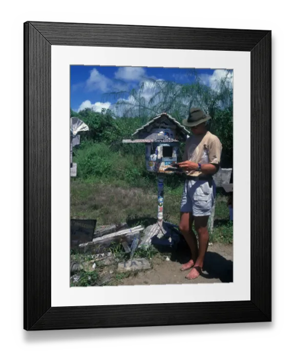Framed Print : Galapagos Collecting post from the barrel at Post Office Bay - Galapagos Framed Print : Galapagos Collecting post from the barrel at Post Office Bay - Galapagos