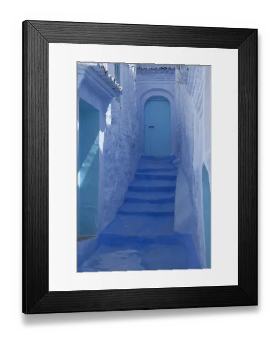 Framed Print : Blue door, buildings and stairway in alley of city, Chefchaouen, Morocco, april Framed Print : Blue door, buildings and stairway in alley of city, Chefchaouen, Morocco, april