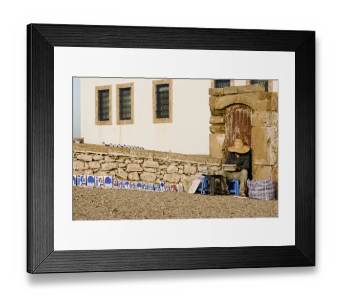 Framed Print : Street painter in coastal city, Essaouira, Morocco, february Framed Print : Street painter in coastal city, Essaouira, Morocco, february