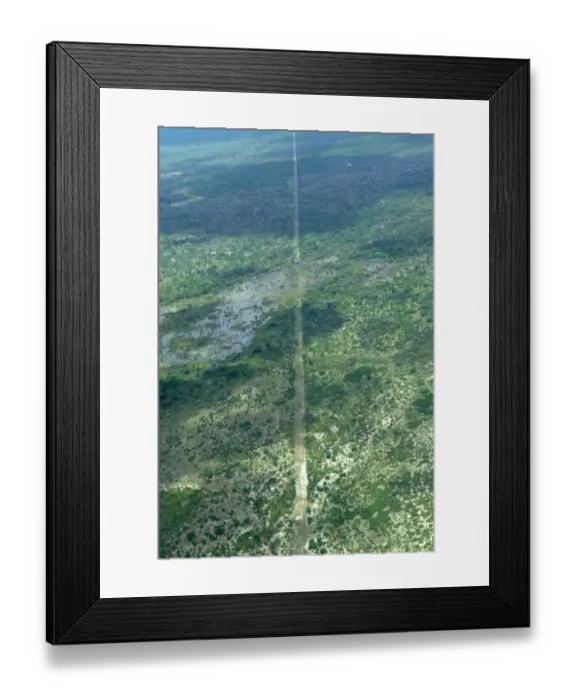 Framed Print : Aerial view of wildlife fence at edge of reserve, Okavango Delta, Botswana Framed Print : Aerial view of wildlife fence at edge of reserve, Okavango Delta, Botswana