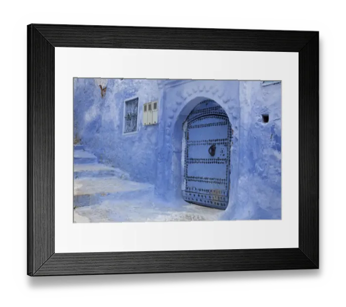 Framed Print : Blue door and stairway in alley of city, Chefchaouen, Morocco, april Framed Print : Blue door and stairway in alley of city, Chefchaouen, Morocco, april