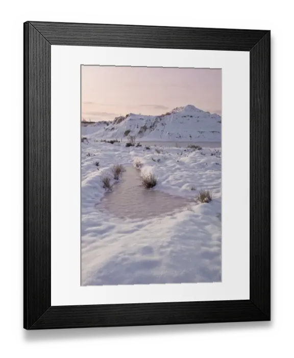 Framed Print : Snow covered sand and gravel quarry at sunrise, Dorset, England, december Framed Print : Snow covered sand and gravel quarry at sunrise, Dorset, England, december