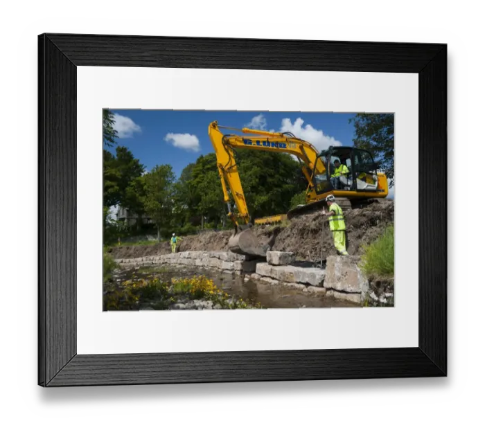 Framed Print : Excavator improving stream bank to help prevent flooding, Cumbria, England, june