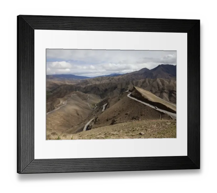 Framed Print : View of serpentine road through mountains, High Atlas, Morocco. may Framed Print : View of serpentine road through mountains, High Atlas, Morocco. may