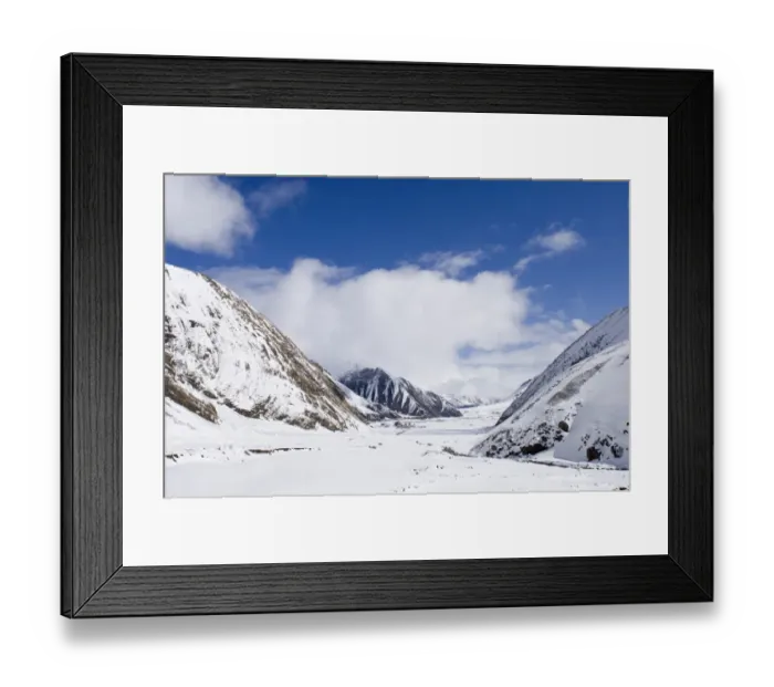 Framed Print : View along snow covered mountain valley, looking towards Kazbegi, Great Caucasus, Caucasus Mountains, Georgia, april Framed Print : View along snow covered mountain valley, looking towards Kazbegi, Great Caucasus, Caucasus Mountains, Georgia, april