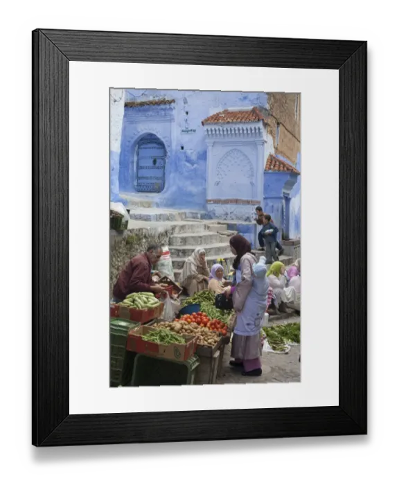 Framed Print : People at market beside blue houses in city, Chefchaouen, Morocco, april