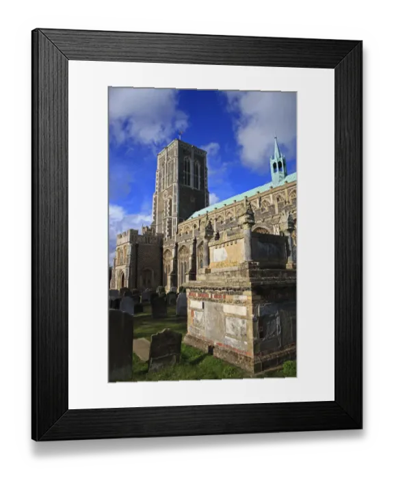Framed Print : Tomb in graveyard of 15th century late medieval church, copper clad roof with fleche, St. Edmund's Church, Southwold, Suffolk, England, october