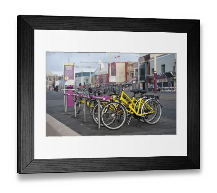 Framed Print : Bicycles for hire in seaside resort town, Blackpool, Lancashire, England, january