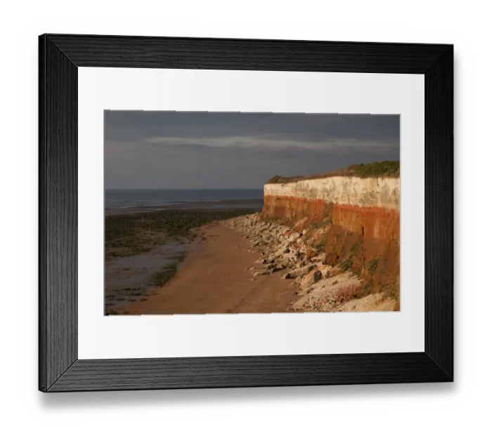 Framed Print : View of eroded chalk and carrstone sea cliffs, Hunstanton, Norfolk, England, october Framed Print : View of eroded chalk and carrstone sea cliffs, Hunstanton, Norfolk, England, october