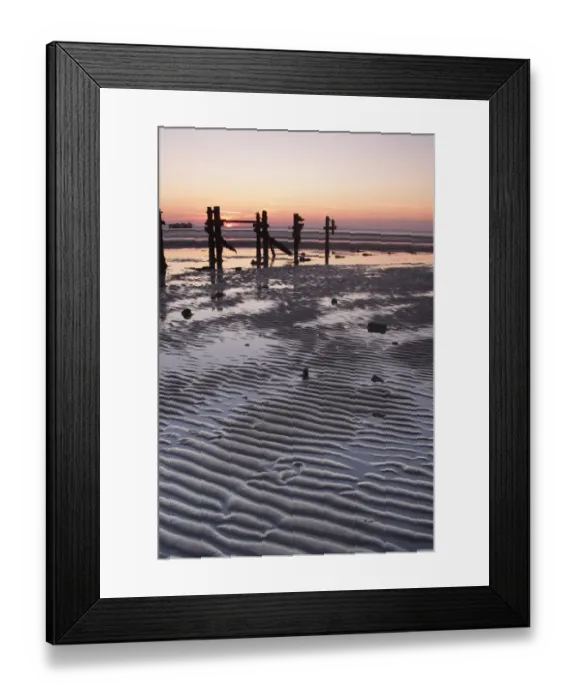 Framed Print : View of ripples in sand and eroded groynes on beach during low tide at sunset, Spurn Point, East Yorkshire, England, october Framed Print : View of ripples in sand and eroded groynes on beach during low tide at sunset, Spurn Point, East Yorkshire, England, october