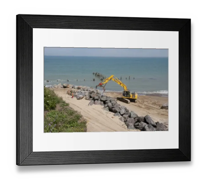 Framed Print : Excavator on beach, repairing sea defences with boulders, Happisburgh, Norfolk, England, august Framed Print : Excavator on beach, repairing sea defences with boulders, Happisburgh, Norfolk, England, august