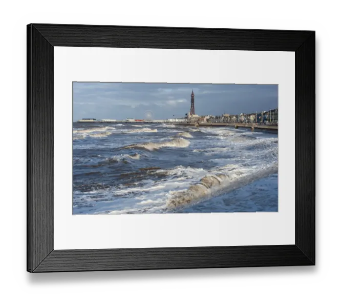 Framed Print : Stormy sea at high tide in seaside resort town, Blackpool Tower in background, Blackpool, Lancashire, England, january Framed Print : Stormy sea at high tide in seaside resort town, Blackpool Tower in background, Blackpool, Lancashire, England, january