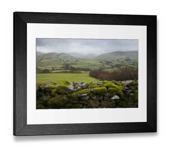 Framed Print : View over moss covered drystone wall towards fell with low clouds, looking towards Howgill Fells, Firbank, Cumbria