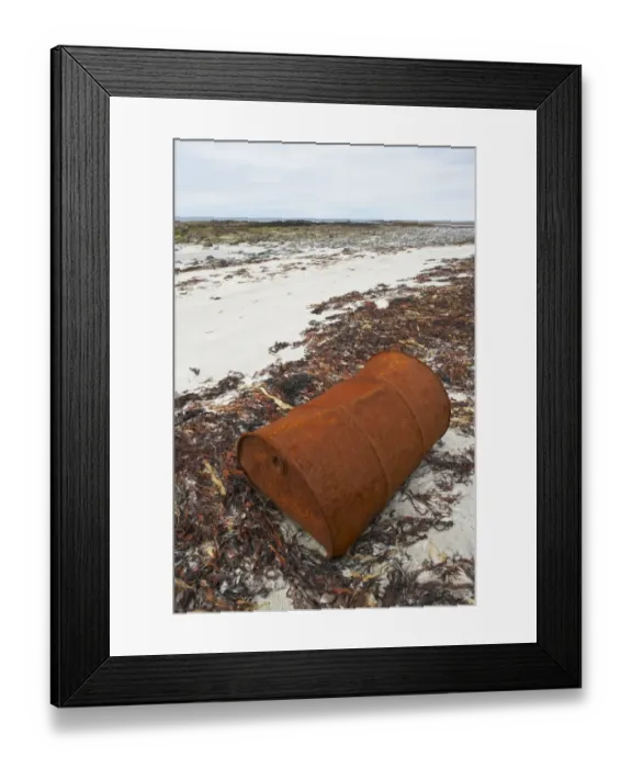 Framed Print : Rusty oil drum along high tide mark on deserted beach, Benbecula, Outer Hebrides, Scotland Framed Print : Rusty oil drum along high tide mark on deserted beach, Benbecula, Outer Hebrides, Scotland