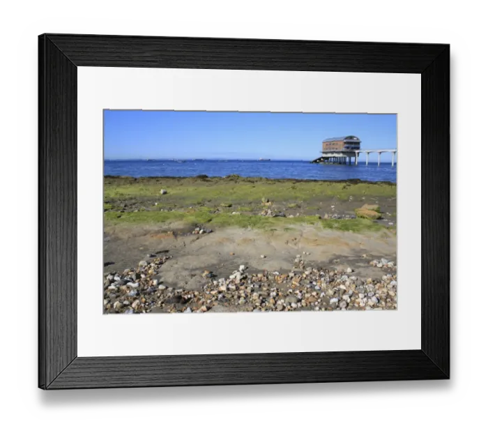 Framed Print : Exposed rocky outcrop on beach at low tide, with lifeboat boathouse, Bembridge Lifeboat Station, Bembridge Framed Print : Exposed rocky outcrop on beach at low tide, with lifeboat boathouse, Bembridge Lifeboat Station, Bembridge