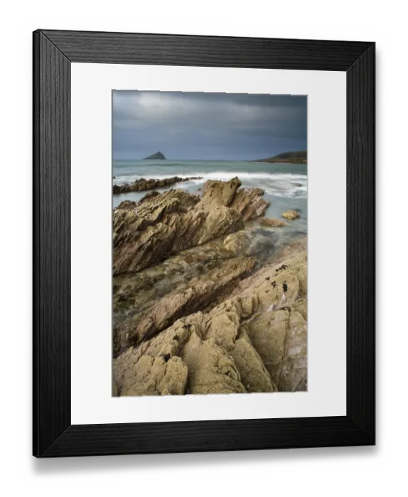 Framed Print : View of rocky beach, with Wembury Point and Great Mewstone Island in distance, Wembury Bay, Devon, England, march Framed Print : View of rocky beach, with Wembury Point and Great Mewstone Island in distance, Wembury Bay, Devon, England, march