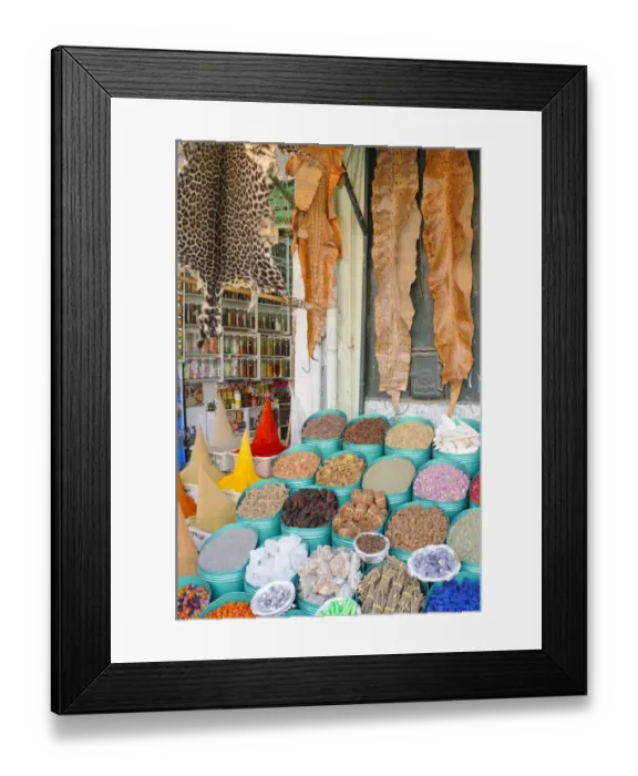 Framed Print : Leopard and snake skins for sale in market beside spices, Marrakesh, Morocco, january Framed Print : Leopard and snake skins for sale in market beside spices, Marrakesh, Morocco, january
