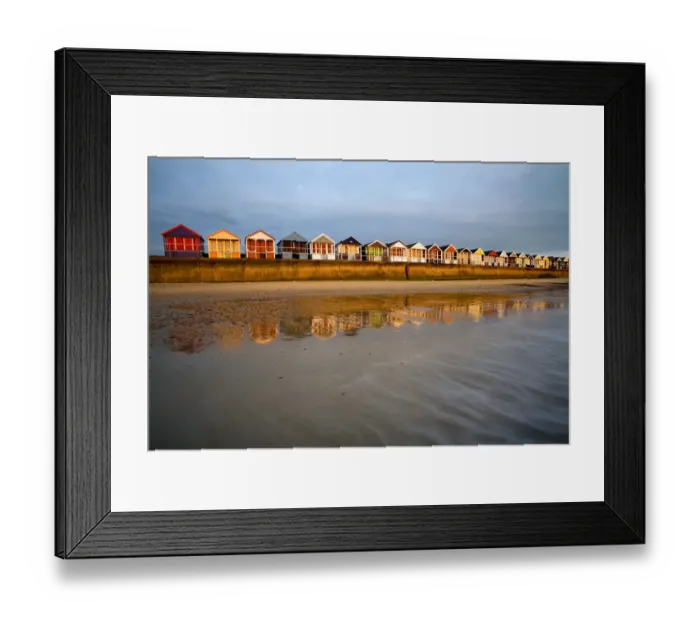 Framed Print : Beach huts on seawall of seaside resort at sunrise, Southwold, Suffolk, England, april Framed Print : Beach huts on seawall of seaside resort at sunrise, Southwold, Suffolk, England, april