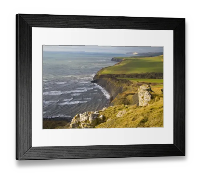 Framed Print : View of coastline with farmland and rough sea from high cliff, near Chapmans Pool, Dorset, England, january Framed Print : View of coastline with farmland and rough sea from high cliff, near Chapmans Pool, Dorset, England, january