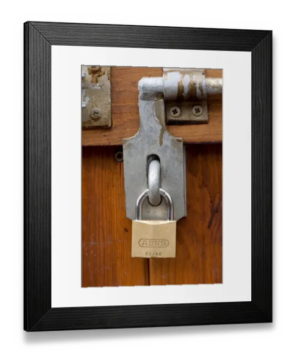 Framed Print : Padlock and bolt on wooden door of barn, Cumbria, England, august