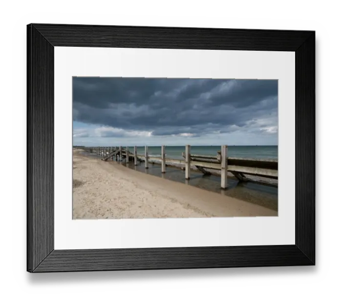 Framed Print : Coastal defence groynes on beach, Happisburgh, Norfolk, England, august Framed Print : Coastal defence groynes on beach, Happisburgh, Norfolk, England, august