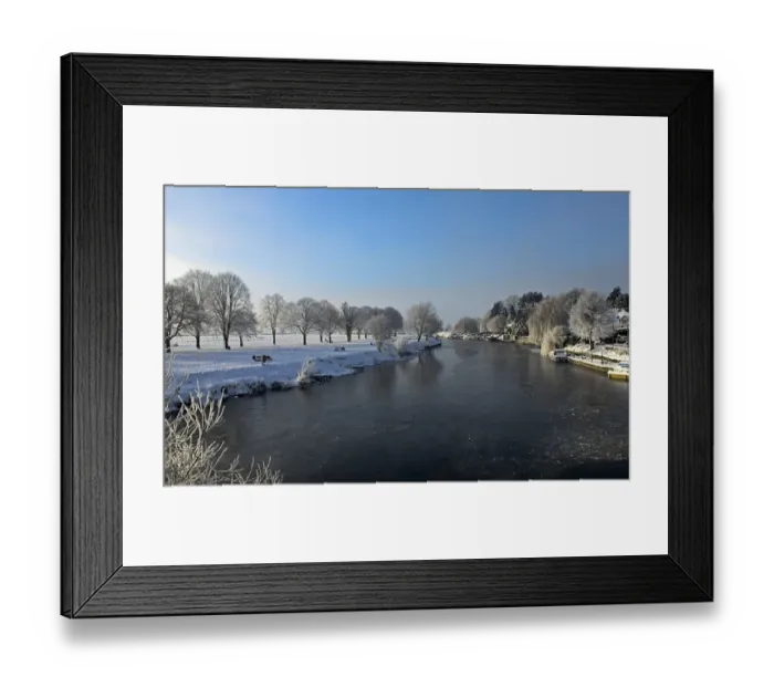 Framed Print : View of partially frozen river and snow covered riverbanks, River Avon, Bidford on Avon, Warwickshire, England