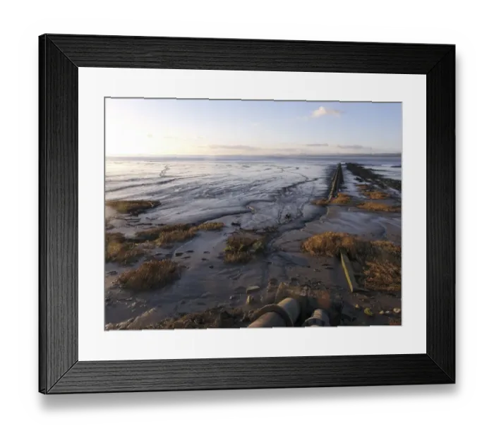 Framed Print : View of pipe going into sea and mudflats at low tide, Severn Estuary, River Severn, Gloucestershire, England, january Framed Print : View of pipe going into sea and mudflats at low tide, Severn Estuary, River Severn, Gloucestershire, England, january