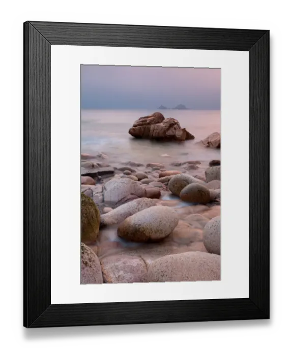 Framed Print : Small stream flowing through boulders on beach into sea at sunset, Porth Nanven, Cornwall, England, march Framed Print : Small stream flowing through boulders on beach into sea at sunset, Porth Nanven, Cornwall, England, march