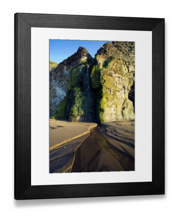 Framed Print : Waterfall flowing from cliffs onto sandy beach, Runswick Waterfall, Runswick Bay, North Yorkshire, England, may Framed Print : Waterfall flowing from cliffs onto sandy beach, Runswick Waterfall, Runswick Bay, North Yorkshire, England, may